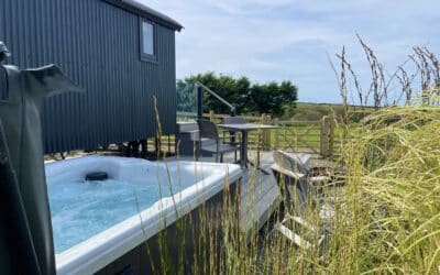 hot tub outside shepherds hut at Pencuke Farm Bude Cornwall