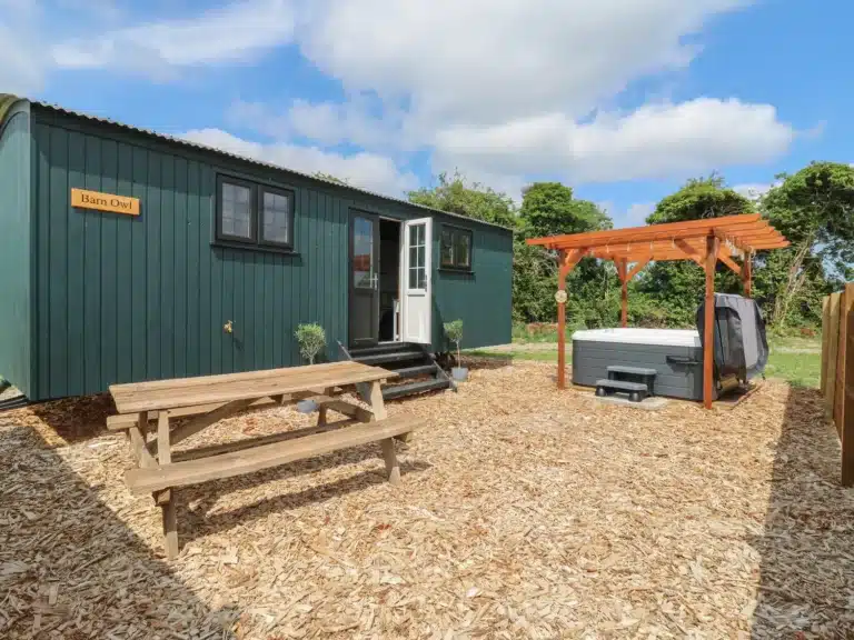 OUtside of a Shepherds Hut at Lodeside Glamping Cambridgeshire