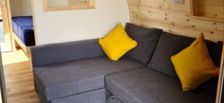 sofa inside Alpaca Glamping Pod at Welltrough Farm Cheshire