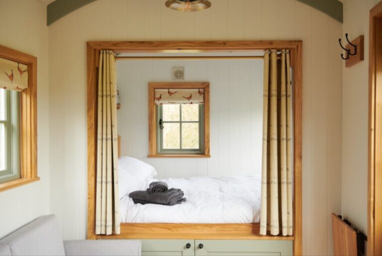 Bedroom in a Shepherds Hut in The South Downs at Foot of The Downs