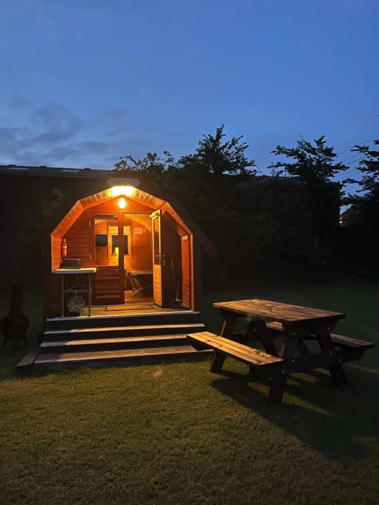 Glamping pod at night at whitehall Farm Norfolk