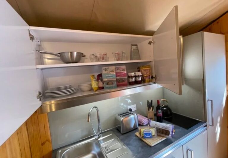 Kitchen inside safari tent Skelwith Fold Park Ambleside