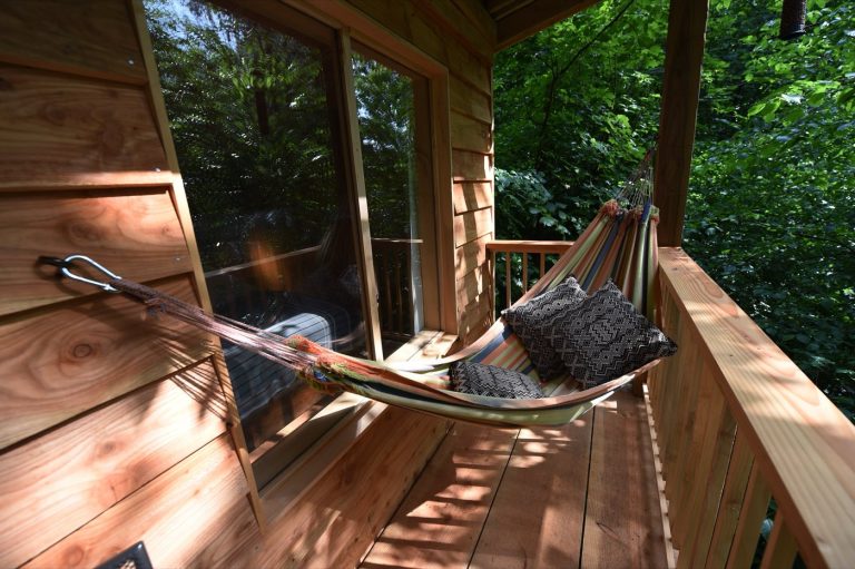 Hammock on the Treetop Cabin balcony at Redwood Valley, overlooking the trees