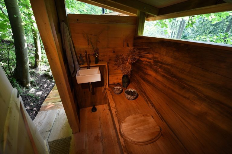 The Treetop Cabin's own private composting loo, reached by a wooden walkway