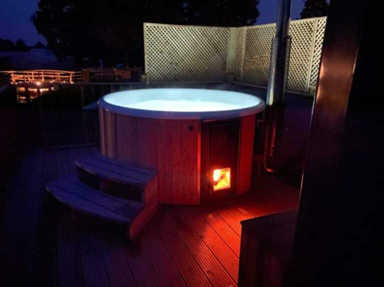 Ragdale Glamping hot tub at night