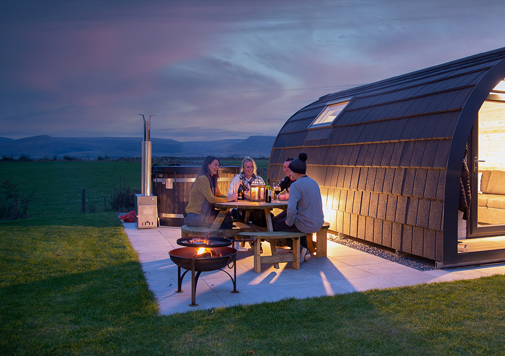 Sitting on deck at night at at Eden Heights Glamping The Eden Valley