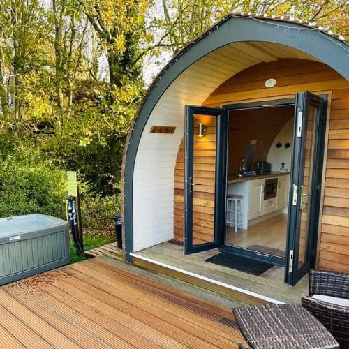 Galmping pod with open doors to deck