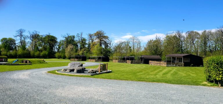 View across Glamping pods at Meadow Falls Glamping, camping and touring site.
