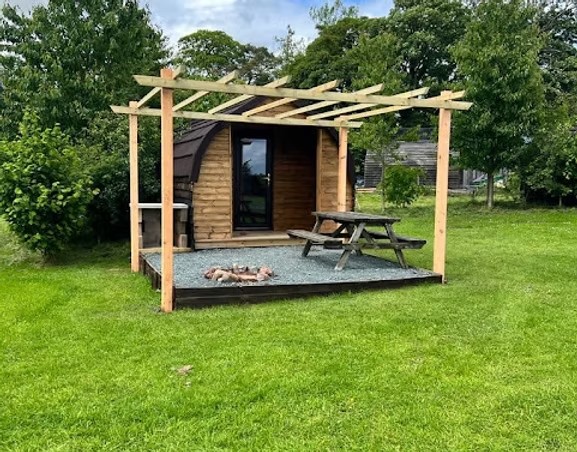 Outside a Glamping pod at Meadow Falls Lancashire