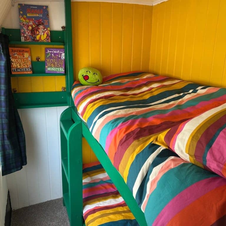 Colourful Bunk Beds in quirky converted London Bus for glamping at Bracken Barns Scotland