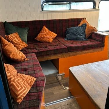 Sofa in quirky converted London Bus for glamping at Bracken Barns Scotland
