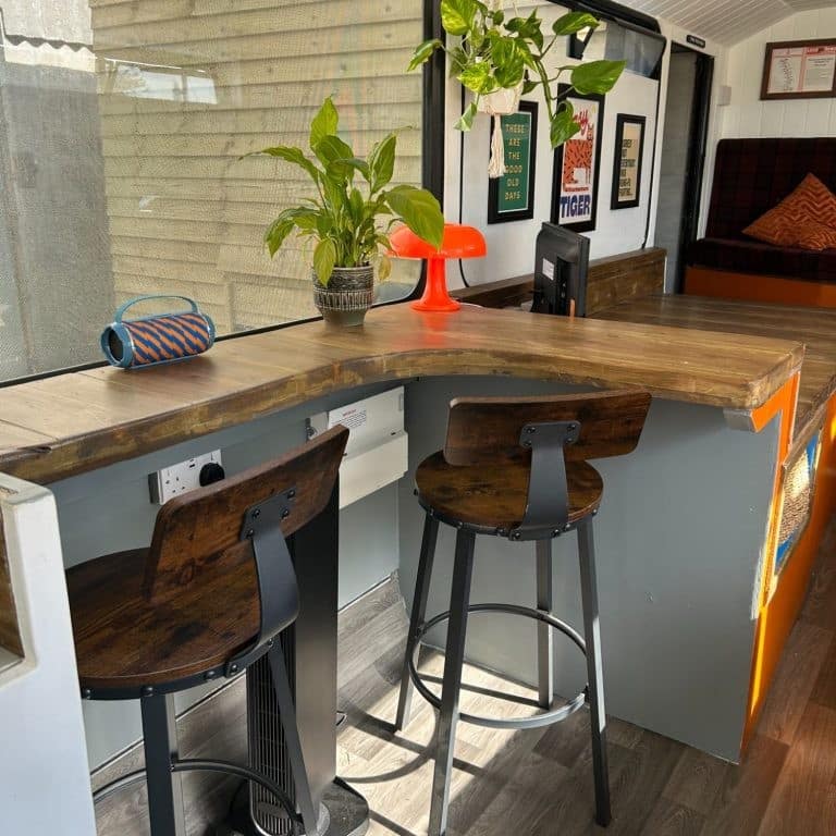 Dining bar in quirky converted London Bus for glamping at Bracken Barns Scotland