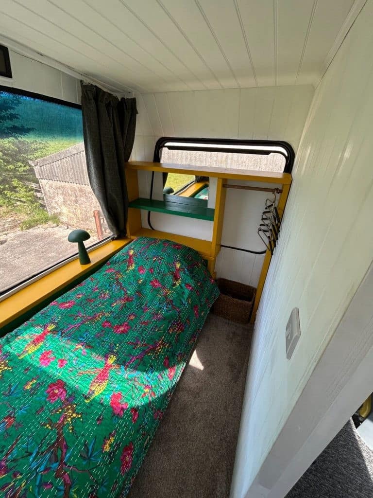 Bed in quirky converted London Bus for glamping at Bracken Barns Scotland