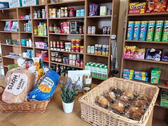 stocked shelves in the shop at Looe Country Park Cornwall