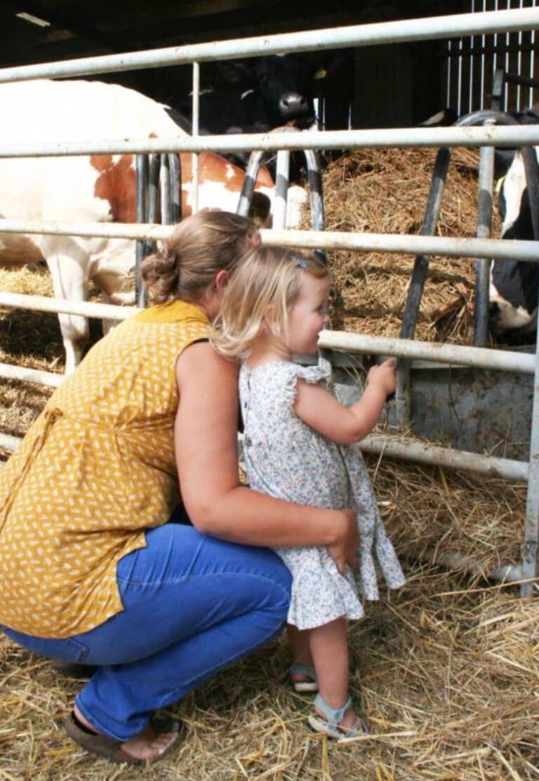 Mother and daughter looking at the animals at Village Farm Hideaway Leicestershire