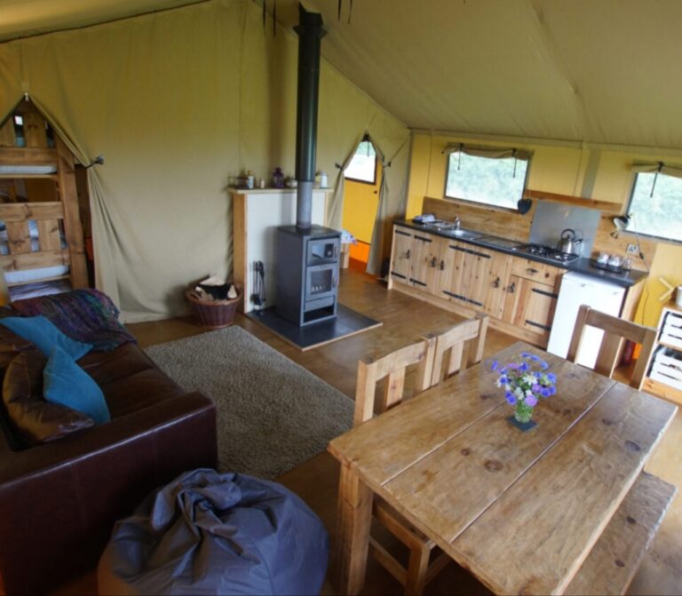 Inside a safari tent at Village Farm Hideaway Leicestershire