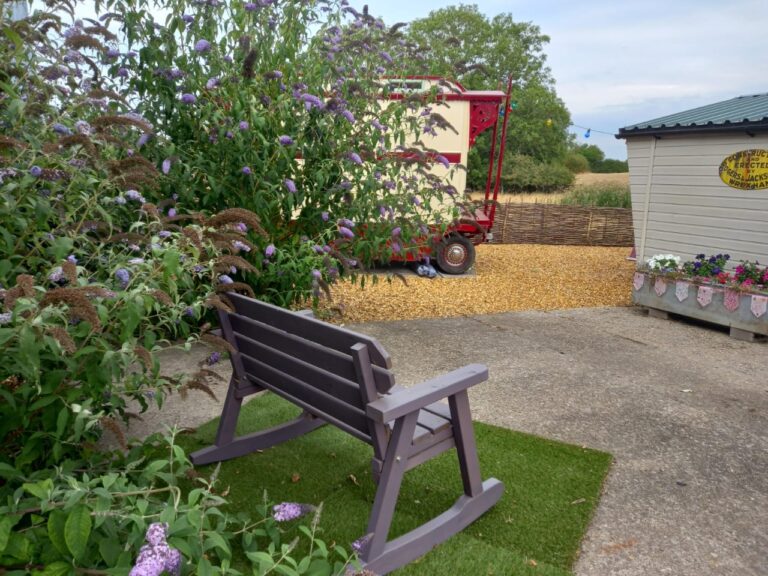 Garden setting oustde Gypsy caravan at Oakpond Cottage
